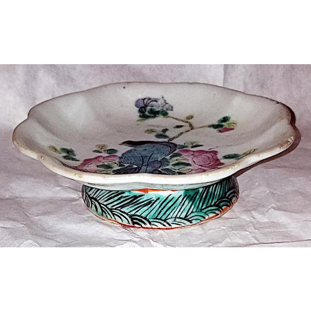 Wonderful 19c Chinese small footed serving bowl from the Qing Dynasty with peacock and floral motif throughout. Someone 90...
