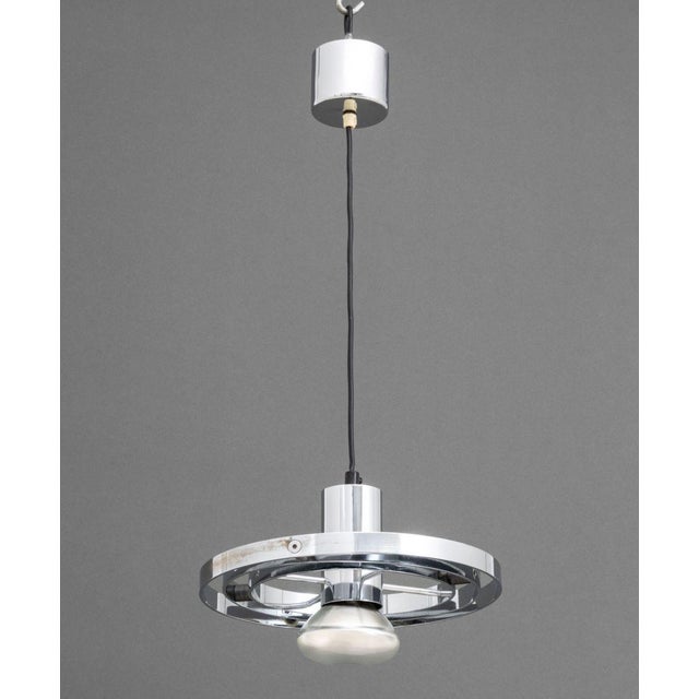 English Chrome-Plated "Fibonacci" Pendant Lamp, marked "Prime Mover London Made in England" to top. 24" H x 11" Diameter....