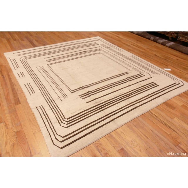 A Decorative and Artistic Ivory Cream Background Brown Geometric Square Design Modern Room Size Area Rug, Country of...