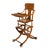 This antique Victorian convertible highchair stroller is a compelling example of late 19th- to early 20th-century...
