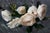 "Roses II" is an oil on panel painting by Jon Doran, completed in 2026. A spray of white roses lies across this small...