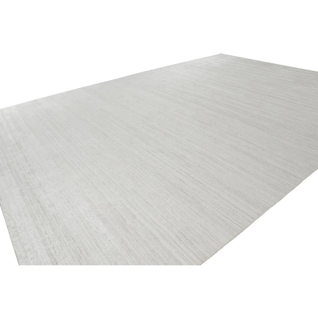 Handmade in art silk, this 13x16 rug is a rich new addition to Rug & Kilim’s Textural rug collection—with an impressive...