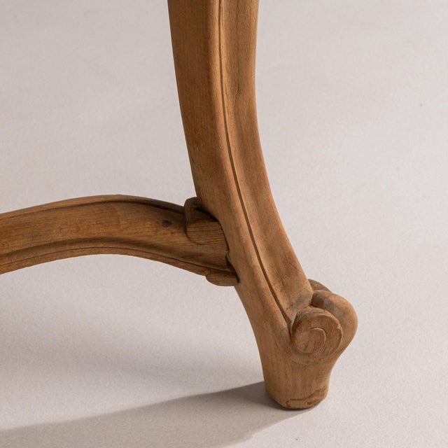 Carved cerused oak console in Weathered Whitewash. The weathered whitewash surface highlights cabriole legs, carved apron...