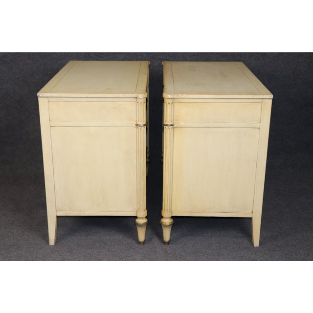 Bring timeless European elegance into your home with this stunning pair of French Directoire–style commodes, beautifully...
