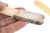 A set of three antique, circa 1817, page turners or paper knifes with a sterling silver mounted ribbed handle and bone...