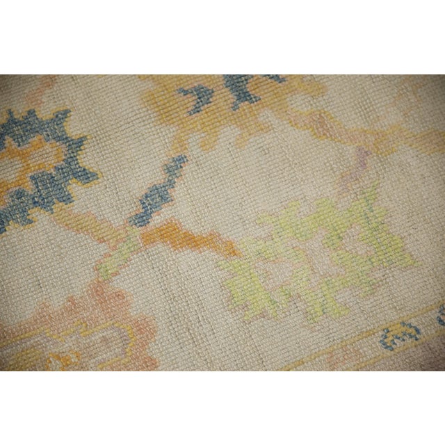 Enhance your living space with the timeless elegance of this Handmade Modern Turkish Oushak Rug. Measuring 3'10" x 5'8",...