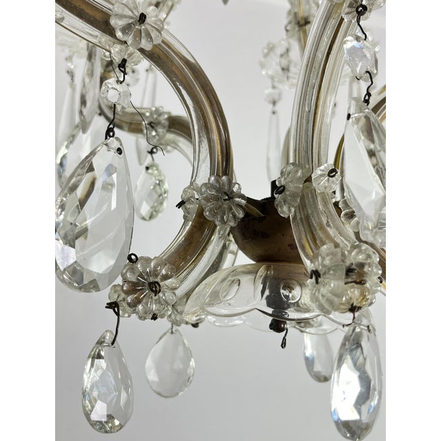 Antique mid-century Italian 5-light crystal chandelier, 1950s. Good condition, some crystals are missing and some have...