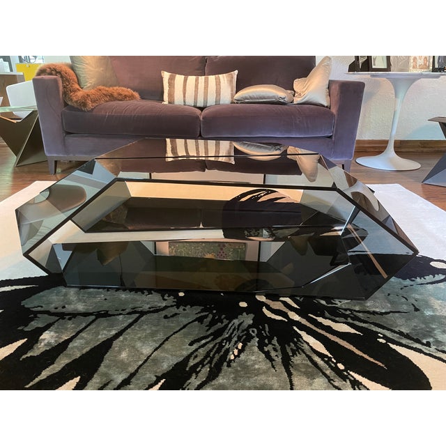 Pair of Tonelli Dekon smoked glass coffee tables by Karim Rashid. Perfect condition. Stunning! Chic in any decor!