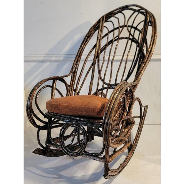 19thc Bentwood / twig child's rocking chair from Pennsylvania in fine condition.The custom made seat cushion in suede /...