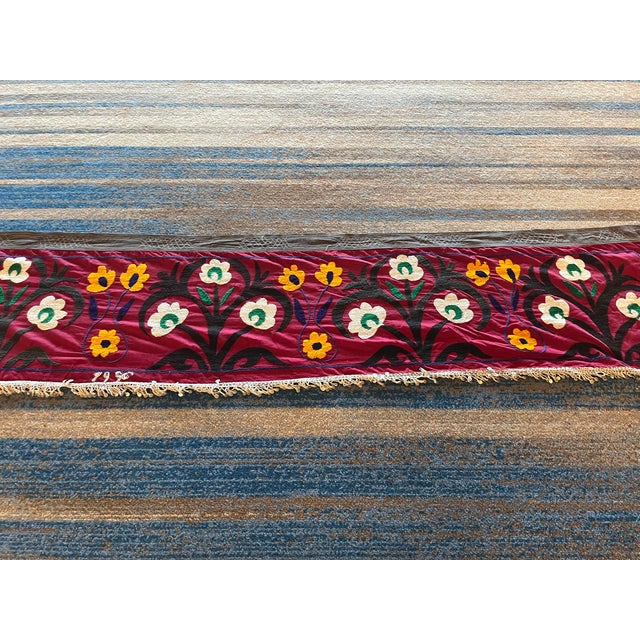 Vintage suzani fabric. Looks beautiful in any home setting and is a great accent to any room. Can be used as wall hanging,...