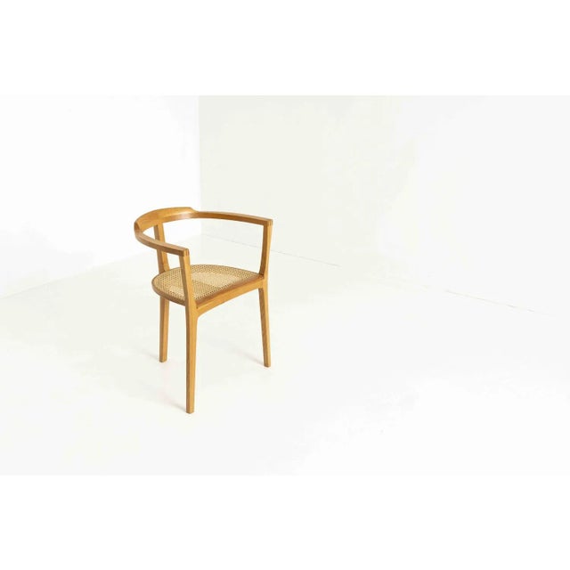 Decorative three-legged chair by master wood maker Xaver Seemüller in wood and cane from Germany. This chair has an...