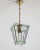 Gorgeous pendant lamp or lantern made of beautifully cut glass and brass details. Made in Italy in the 1950s. Perfect for...