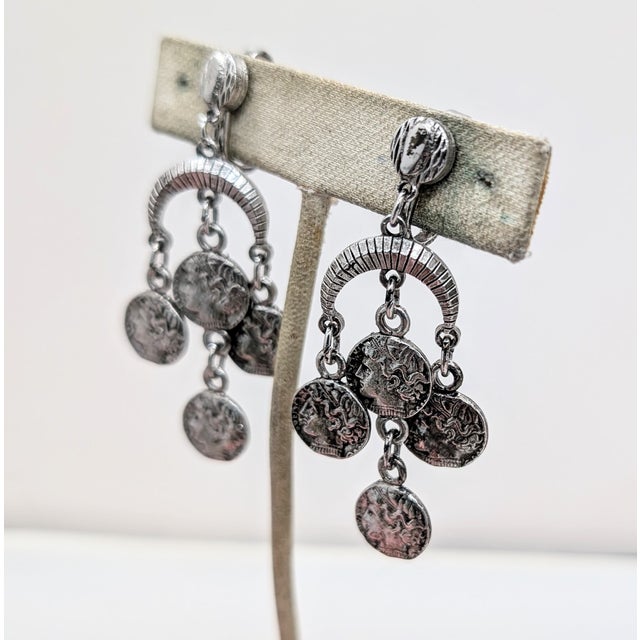 Mid-Century Modern Vintage 1970s Signed Crown Trifari Rhodium Plated Alexander the Great "Coin" Chandelier Clip Earrings-2 Pieces For Sale - Image 3 of 8