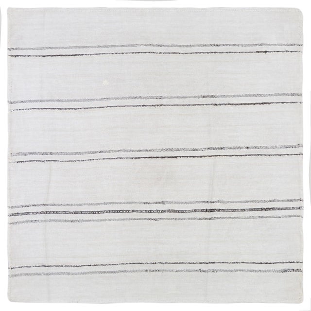 Flatweaved with care using traditional rug-making techniques, this wool rug blends timeless craftsmanship with a modern...