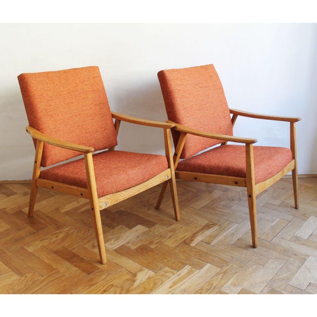This rare pair of armchairs was produced in Czechoslovakia during the 1960s and represents a beautiful example of the...