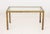 Modern Glass Top Brass Dining Table, with rectangular glass top. 29" H x 54" W x 30" D. Provenance: From a 201 E 66th...