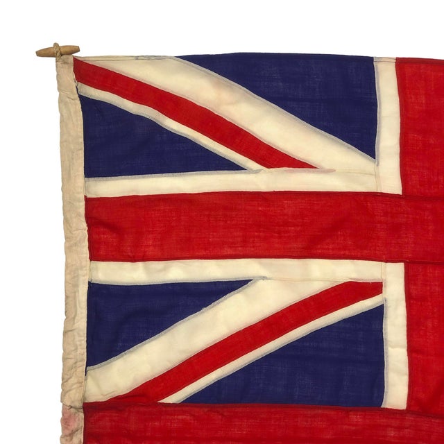 This large vintage Red Ensign flag of Great Britain is made from a sheer woolen cloth. Union Jack is fully sewn and...