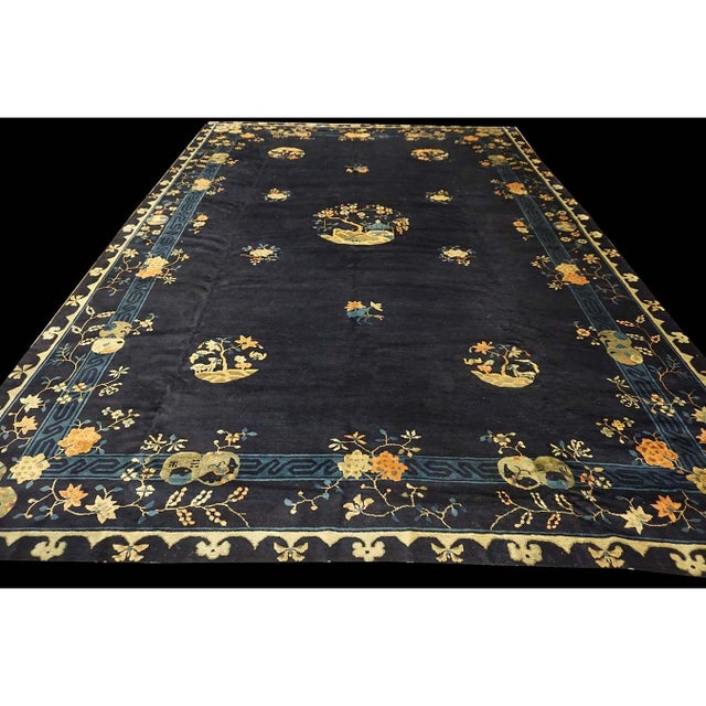 Antique Large Chinese - Peking Knotted Rug ornate, Circa Date: 1920s. This exceptional example of early 20th-century...