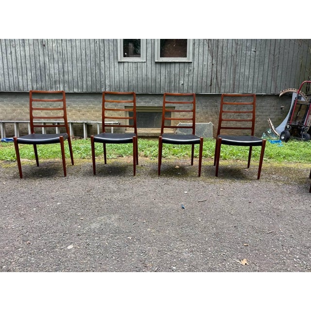 Set of 4 Model 82 High ladder Back Dining Chairs, designed by Niels Otto Moller in 1971 for J.L. Mollers Mobelfabrik...