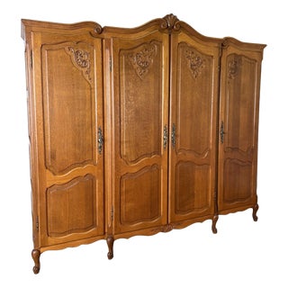 Vintage French Louis XVI Style Carved Oak 4-Door Armoire For Sale