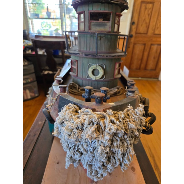 An amazing one of a kind, large hand made model tug boat called 'SPLENDOR'. The hull appears to be made of metal with...