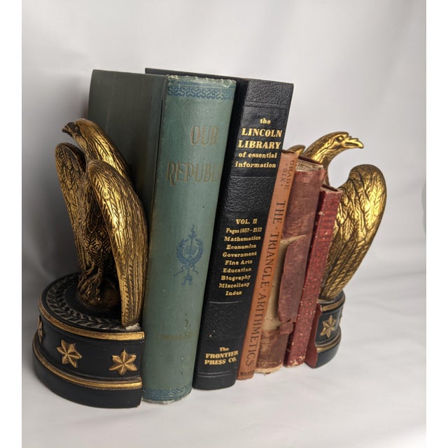 An intriguing collection of five antique and vintage hardcover books celebrating American history, education, classical...