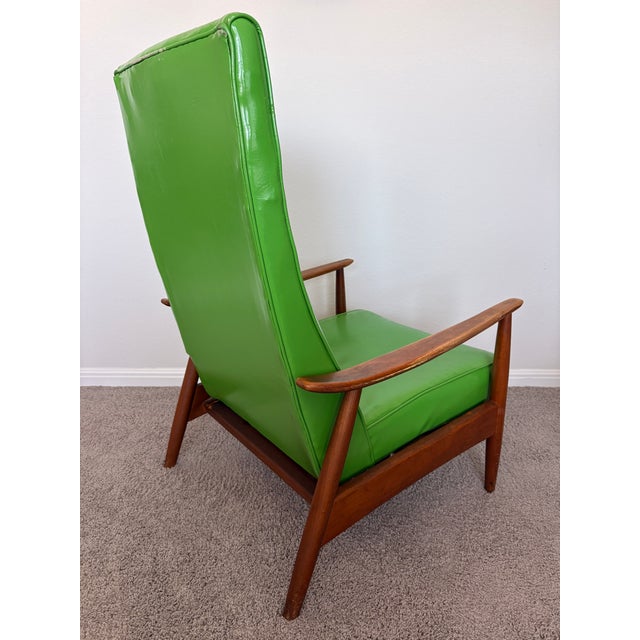 Attributed Milo Baughman Model 74 recliner, a classic mid-century modern design known for its clean architectural lines,...