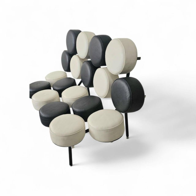 The Marshmallow Sofa, created in the 1950s, is an iconic piece of modern design. It consists of 18 marshmallow-like...