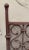 American wrought iron free standing fire screen with flanking ball finials, decorative scrolled centered panel with...