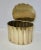 Brass desk container box. Solid sheet brass rolled into a cylindrical box with 16 rolled lobes. The lid is hinged across...