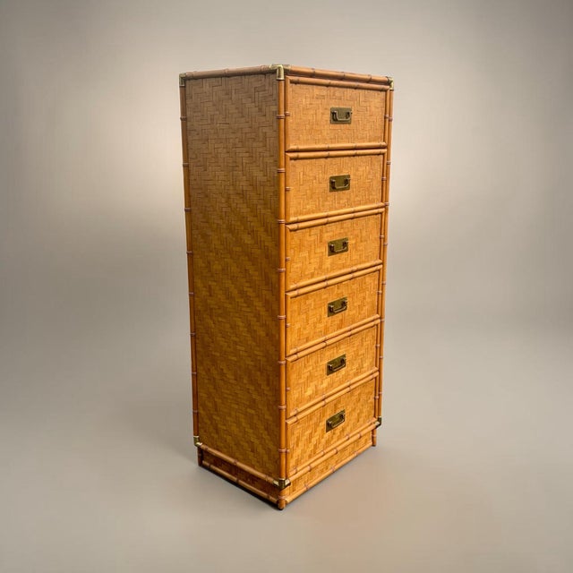 A fine 6 drawer tall lingerie chest by Dixie furniture. A beautiful functional piece with finely turned wood frame and...