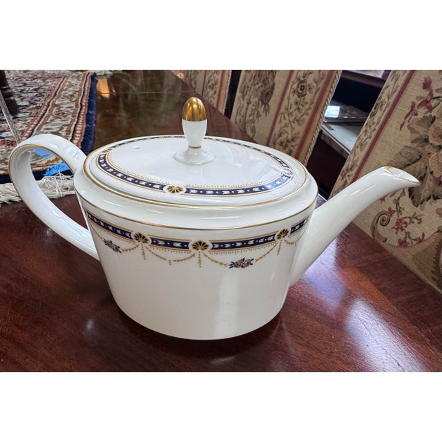 Elegant 22-piece tea, coffee and dessert service for six by Coalport in the discontinued Sherborne pattern, dating to...