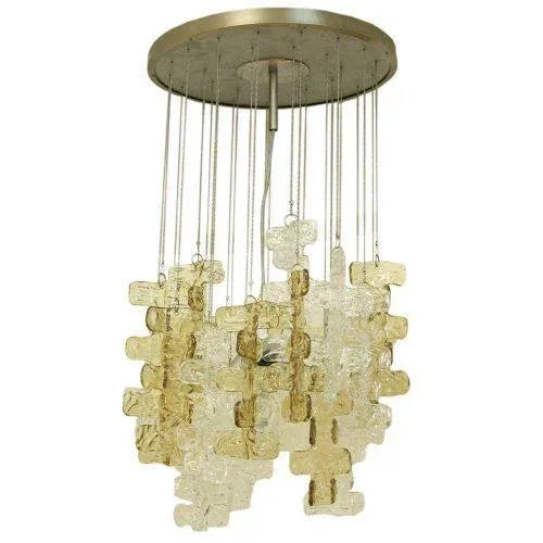 A pop art ceiling light, blown clear and smoked glass components suspended on a chain. A 1950s design by Mazzega....