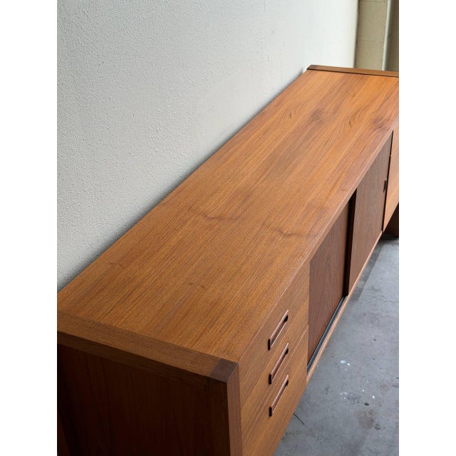 Danish Teak Low Credenza - Mid 20th Century Modern Sideboard With Drawers and Sliding Doors For Sale - Image 4 of 10