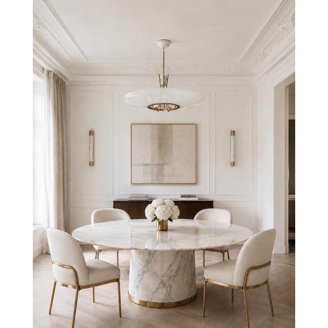 A beautifully refined mid-century modern chandelier that embodies understated luxury and timeless sophistication. Crafted...