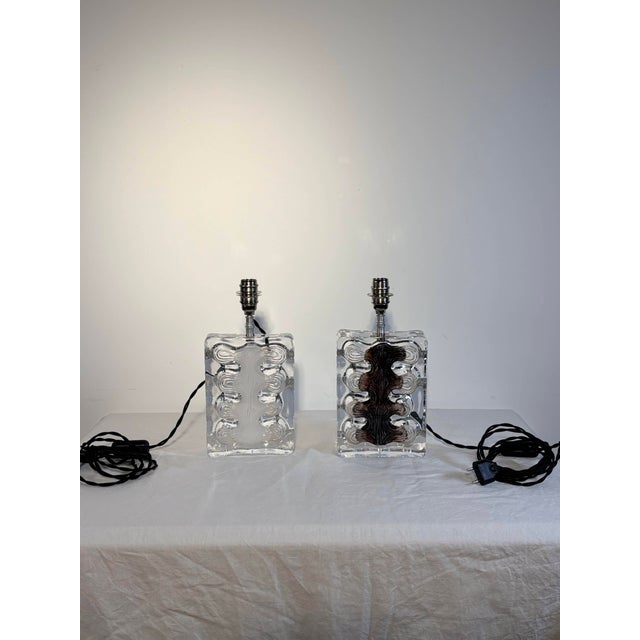 Pair of lamps with rectangular bases in solid crystal, Lynx model, created in 1973 by sculptor Jean-Pierre Demarchi, then...