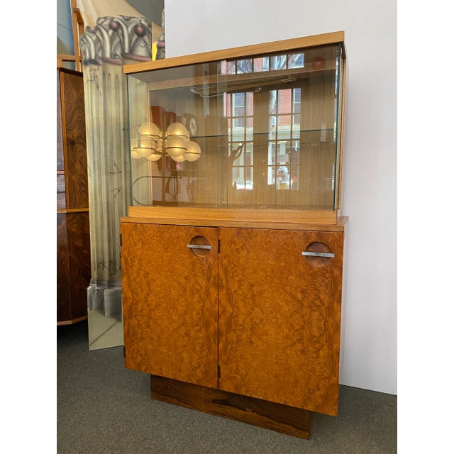 Gilbert Rohde for Herman Miller Formal Dining Group Display Cabinet. Beautiful Burled Veneer Doors with Round recessed...