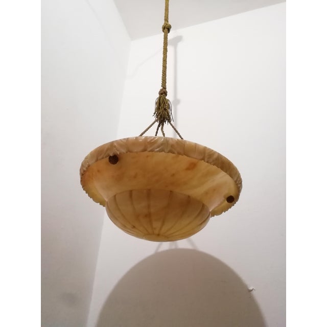 Handcrafted alabaster ceiling lamp. Guaranteed lighting effect. Alabaster, with its ability to transmit light, creates a...