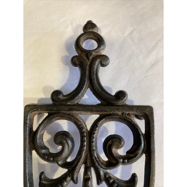 Black Early 20th Century Griswold Cast Iron Trivet With Ornate Scrollwork For Sale - Image 8 of 12