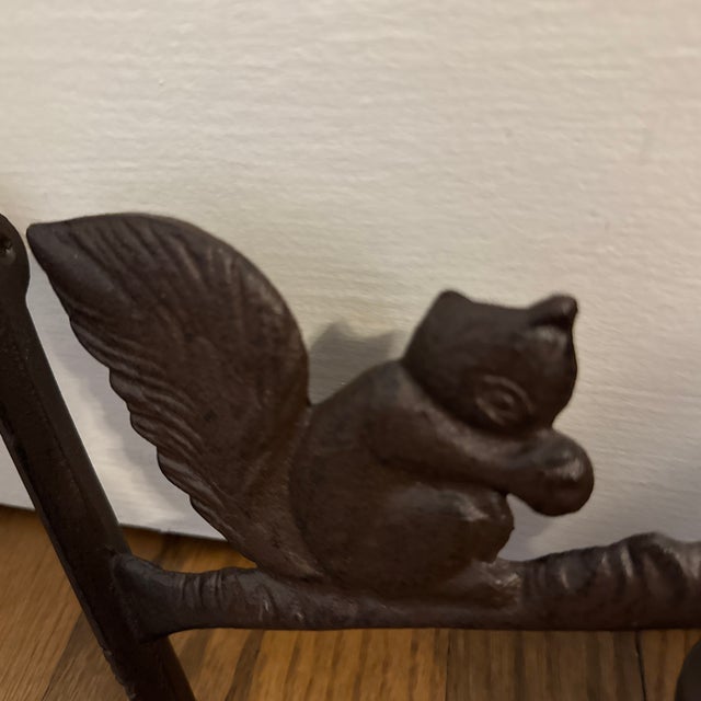 Vintage Wall Mount Cast Iron Squirrel Bell. Bell has a loud, solid ring.