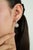 These Art Deco-inspired drop earrings feature 2.29 carats of fancy yellow and white diamonds set in 18K white gold. The...