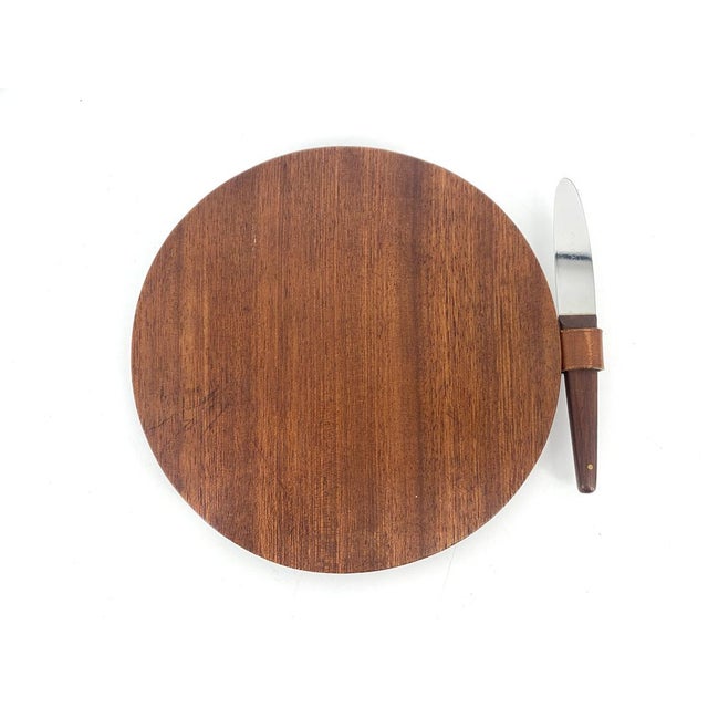 * Manufacturer: Auböck Werkstätten * Designer: Carl Auböck * Type: Cutting board with integrated knife * Origin: Austria *...