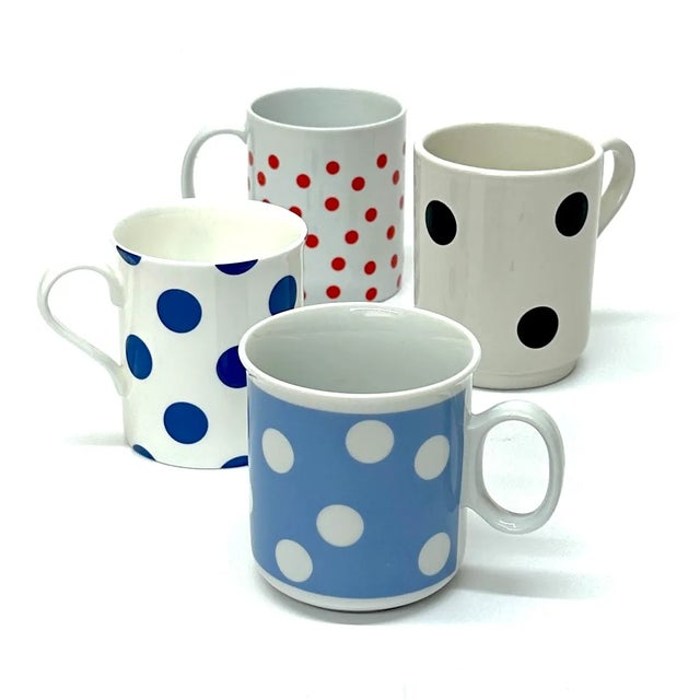 Vintage Polka Dot Mugs, group of 4 A charming set of vintage ceramic mugs with assorted multicolored polka dots. The set...