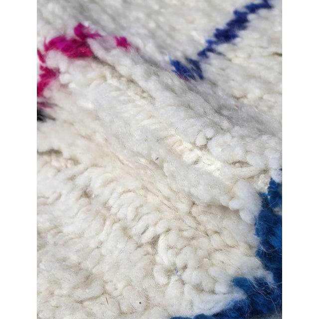 Moroccan Rug Carpet – Handmade Azilal Berber Wool Rug This handmade Moroccan rug carpet showcases the beauty of...
