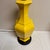 Brighten your space with this elegant vintage yellow crackle glaze table lamp. Its vibrant color adds a touch of warmth...