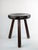 Dimensions: Ø35 x H46 cm Tripod stool composed of a slightly concave, beveled pebble-shaped seat and three tapered legs...