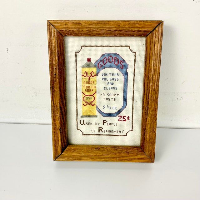 This is a fun little Americana Cross Stitch Folk Art piece that’s framed in an Oak wood under glass. It makes a cute...