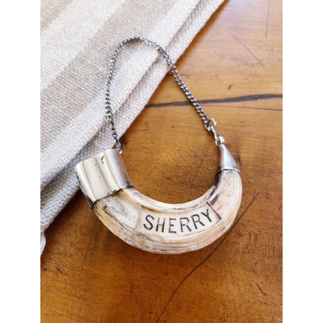 An antique British colonial circa late 1870s Sherry decanter tag with sterling silver end caps. In great condition for its...