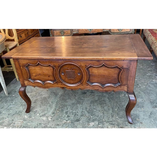 French 19th century provençal walnut knee hole desk with 5 drawers and cabriole legs.