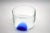 Large centerpiece Mazzega Murano 1970s. In clear blown glass with beaten work and submerged blue spot. In excellent...